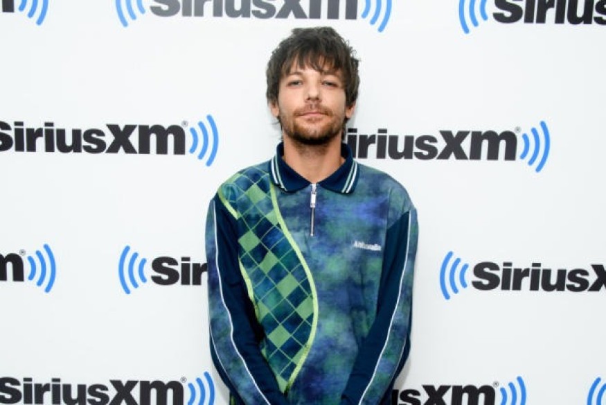 Louis Tomlinson compared himself to his One Direction bandmates for 'a long time'