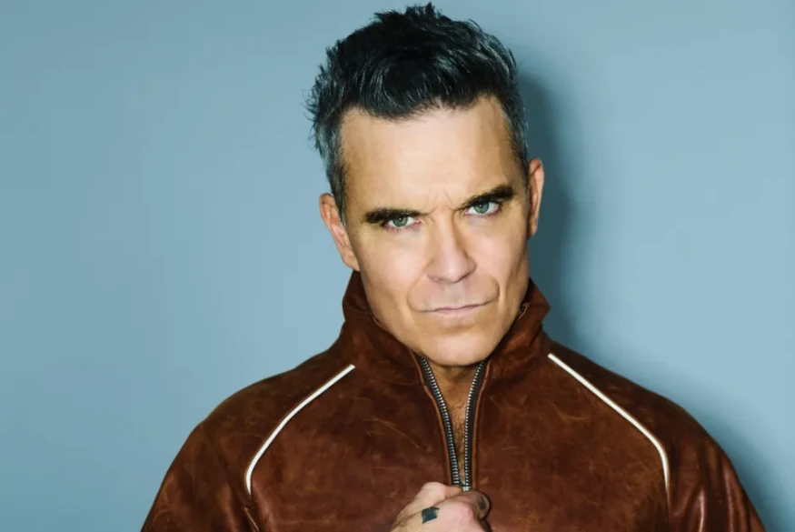 Robbie Williams Looks Back at the 90s, Success, and the Fame He Couldn’t Enjoy